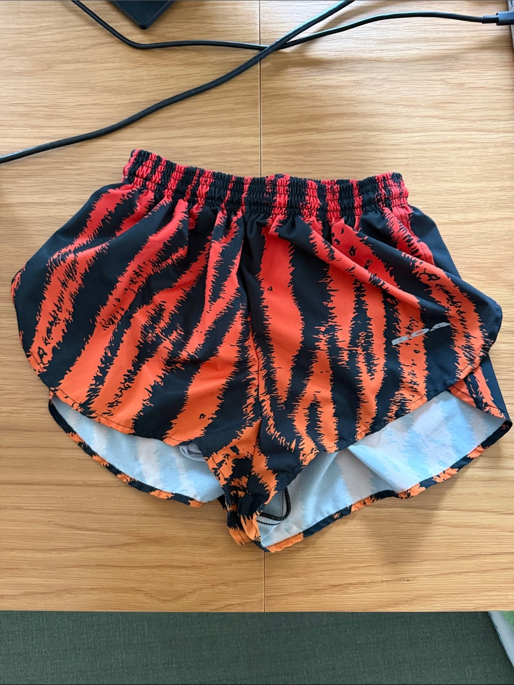 Men’s Boa 2” Orange & Black Printed Running Shorts
